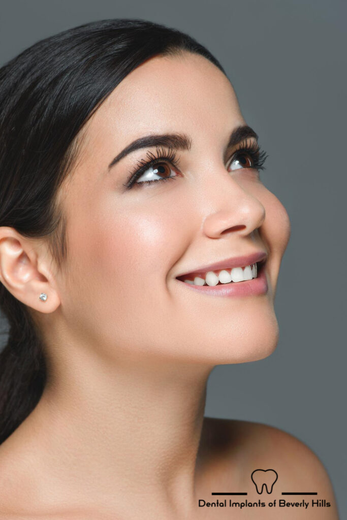 woman with restored smile smiling